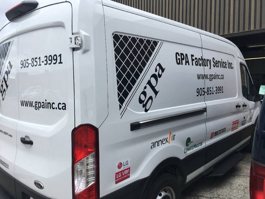 White service van with company lettering