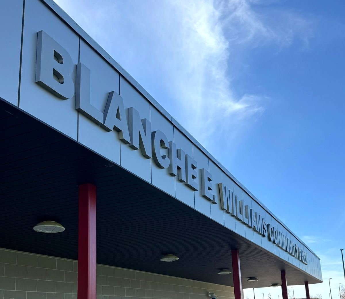 Dimensional letters reading Blanche E. Williams Community Park along entrance canopy fascia